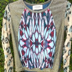 Women’s sheer sleeved top.